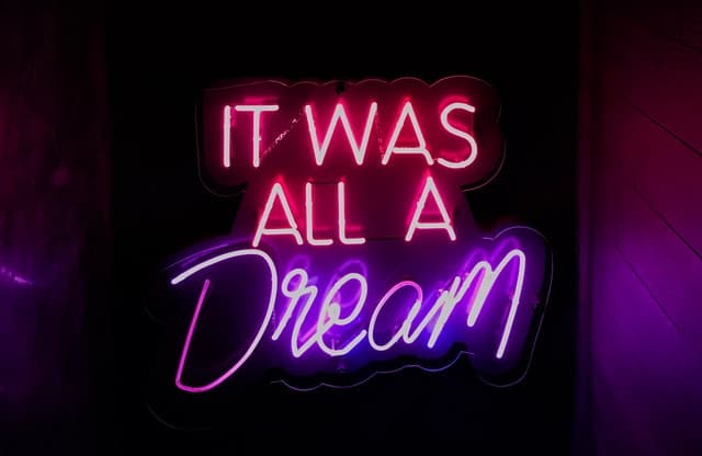 An image of the words "it was all a dream"

Photo by Nadi Lindsay from Pexels